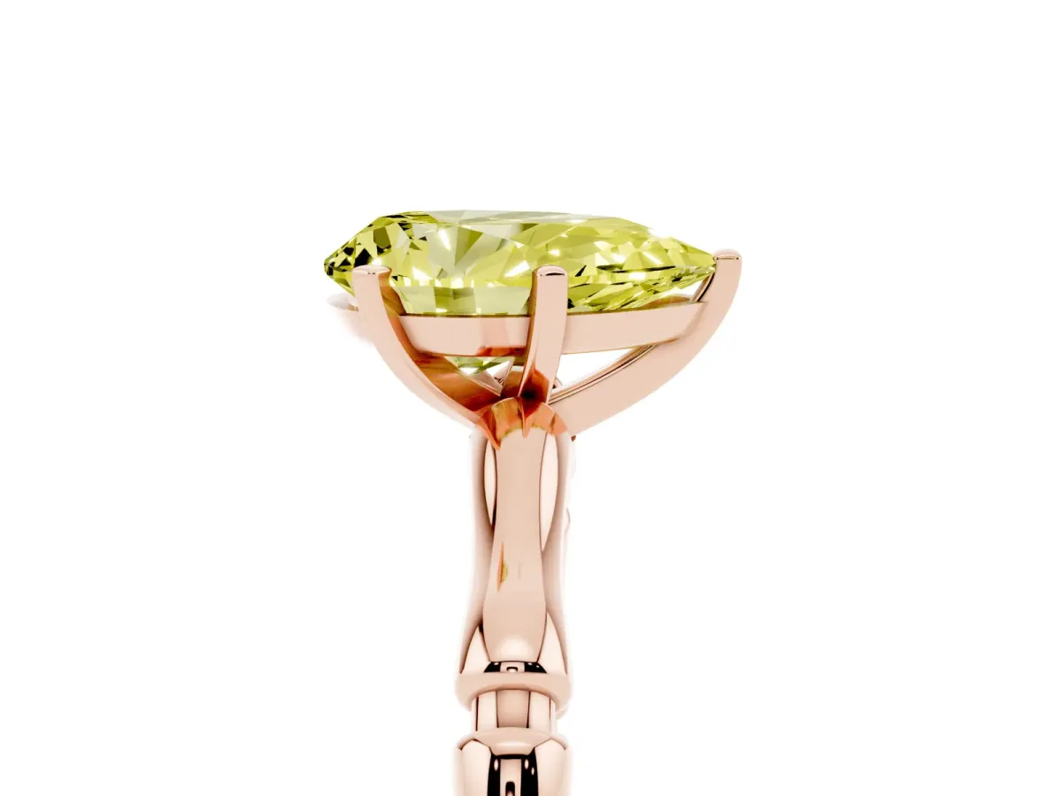 Fancy Yellow Pear Cut Solitaire Diamond Ring with Bamboo Band and Four-Prong Setting Rose gold