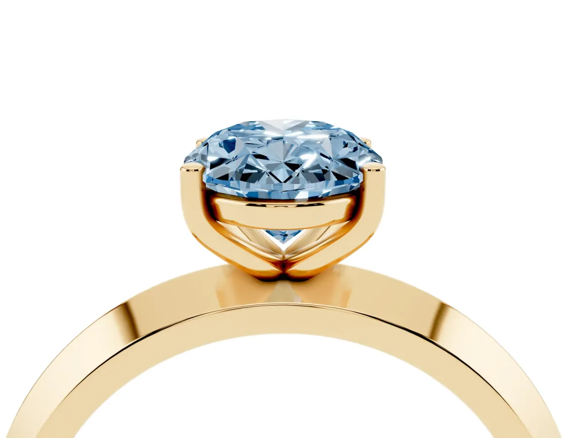 Fancy Blue Oval Cut Cut Solitaire Engagement Ring with Flat Band and Four-Prong Setting Yellow gold