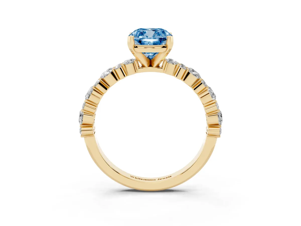 Fancy Blue Cushion Cut Diamond Side Stone Solitaire Ring with Round and Four-Prong Setting Yellow gold