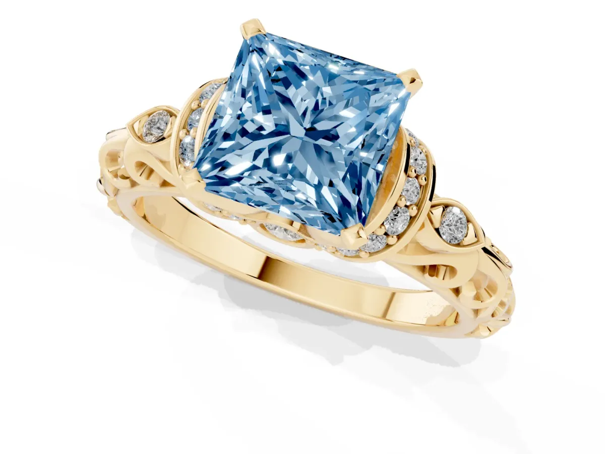 Fancy Blue Princess Cut Diamond Solitaire Ring with Filigree Band and Four-Prong Setting Yellow gold
