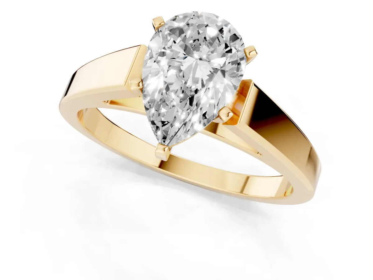 Pear Cut Solitaire Engagement Ring with Four-Prong Setting and Tapered Band Yellow gold