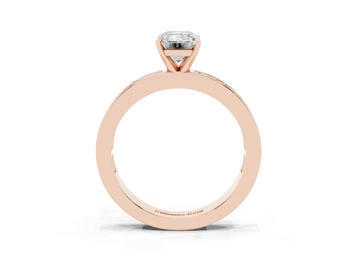Emerald Cut Solitaire Diamond Ring with Channel-Set Baguette Band and Four-Prong Setting Rose gold
