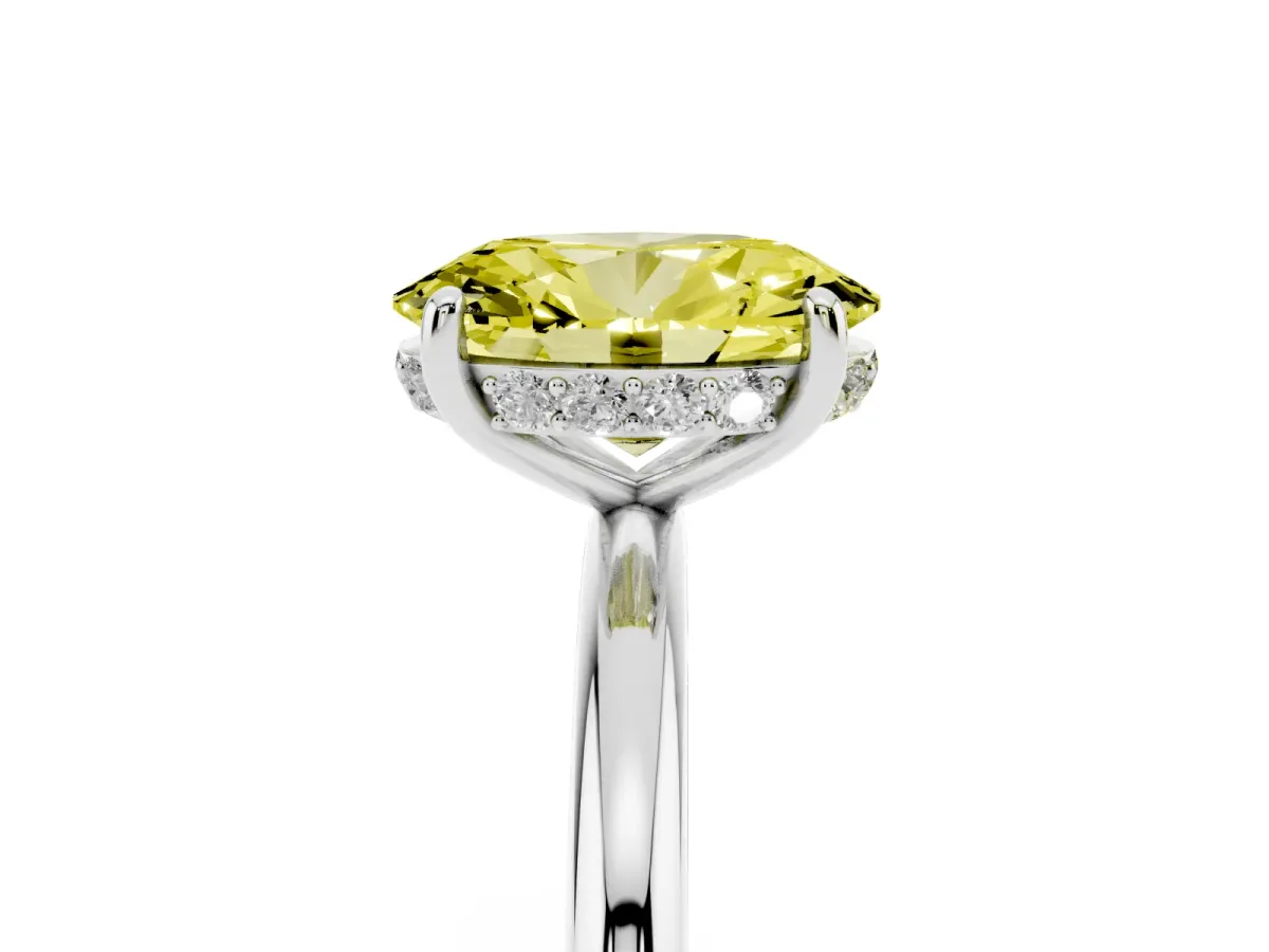Fancy Yellow Oval Cut Solitaire Diamond Ring with a Classic Band and Four-Prong Setting Silver