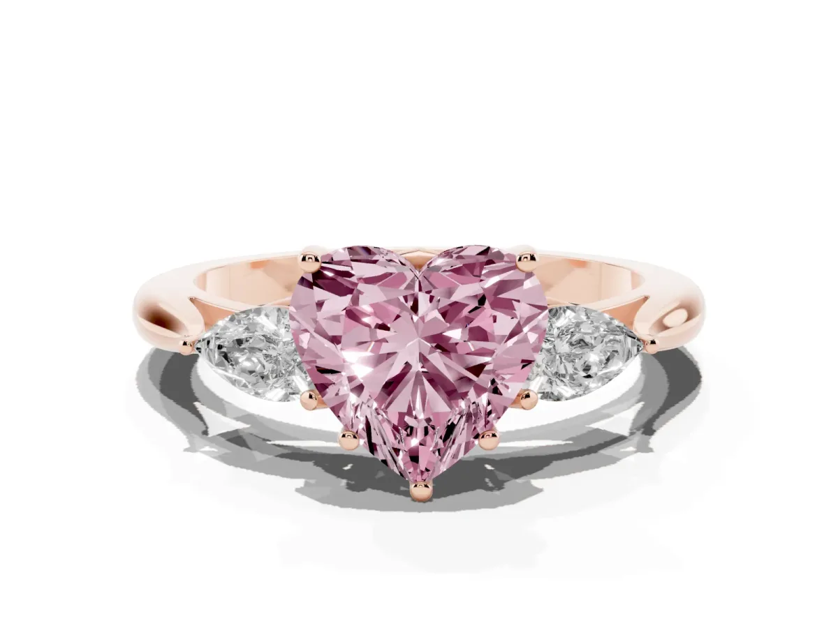 Fancy Pink Heart Cut Diamond Three-Stone Ring with Pear Side Stones and Prong Setting Rose gold