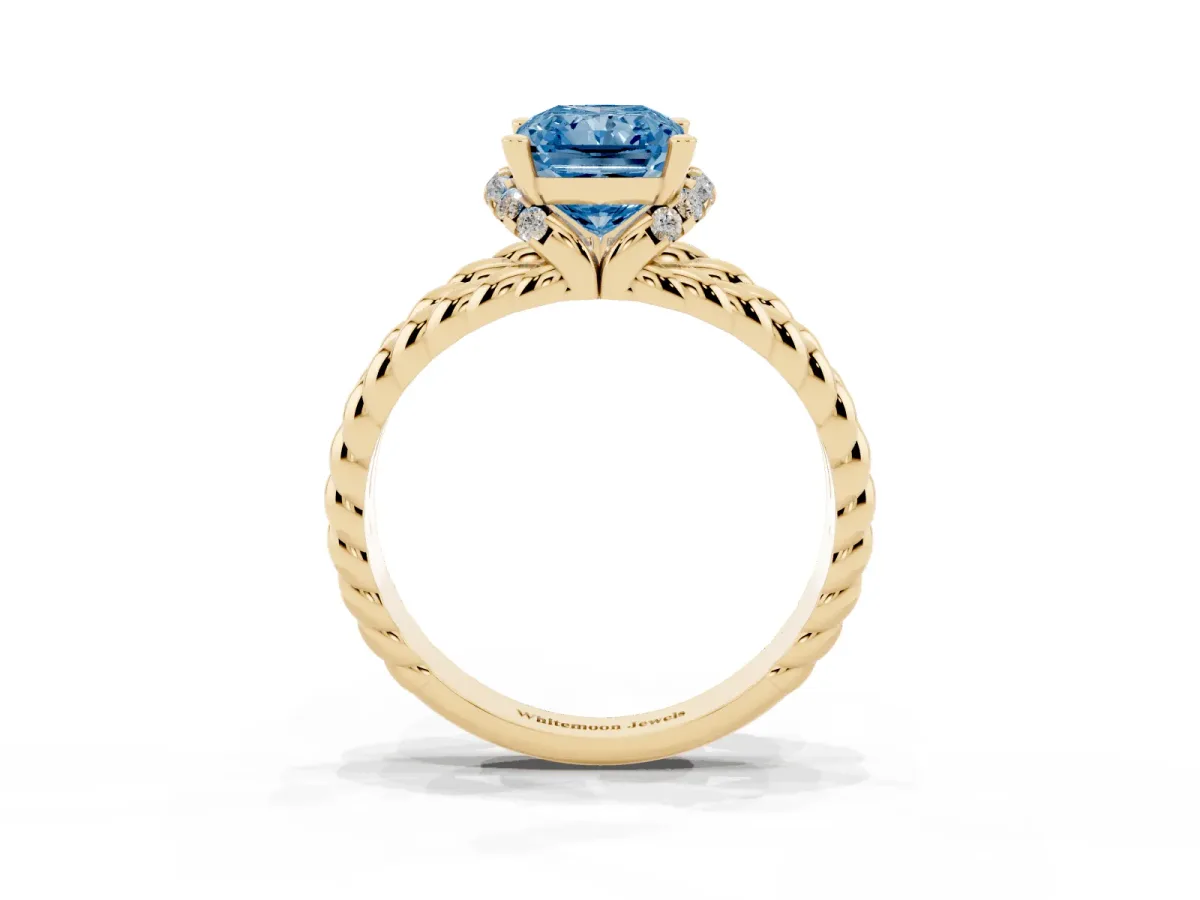 Fancy Blue Radiant Cut Halo Twisted Band Four-Prong Ring Yellow gold