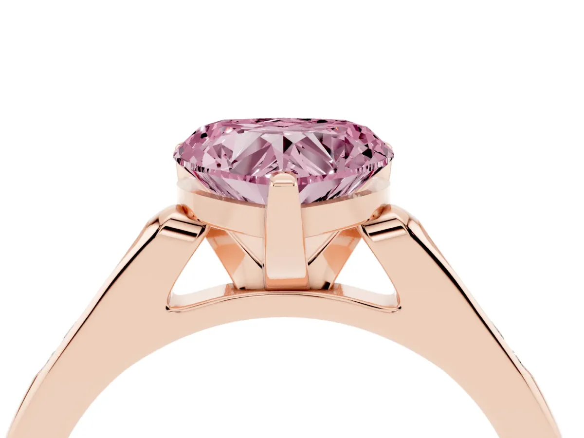 Fancy Pink Heart Cut Diamond Solitaire Ring with Channel Set Round Band and Prong Setting Rose gold