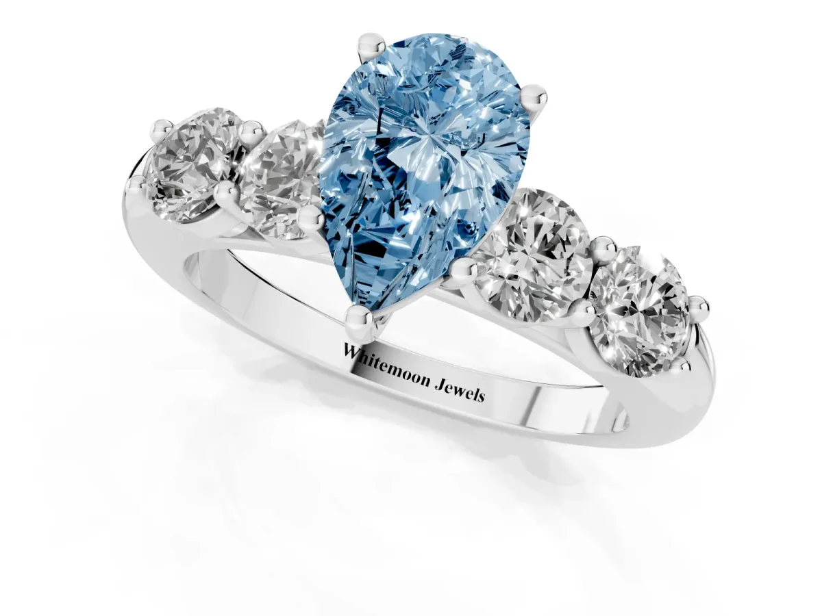 Fancy Blue Pear Cut Cut Five-Stone Prong Set Diamond Ring with Classic Band Platinum
