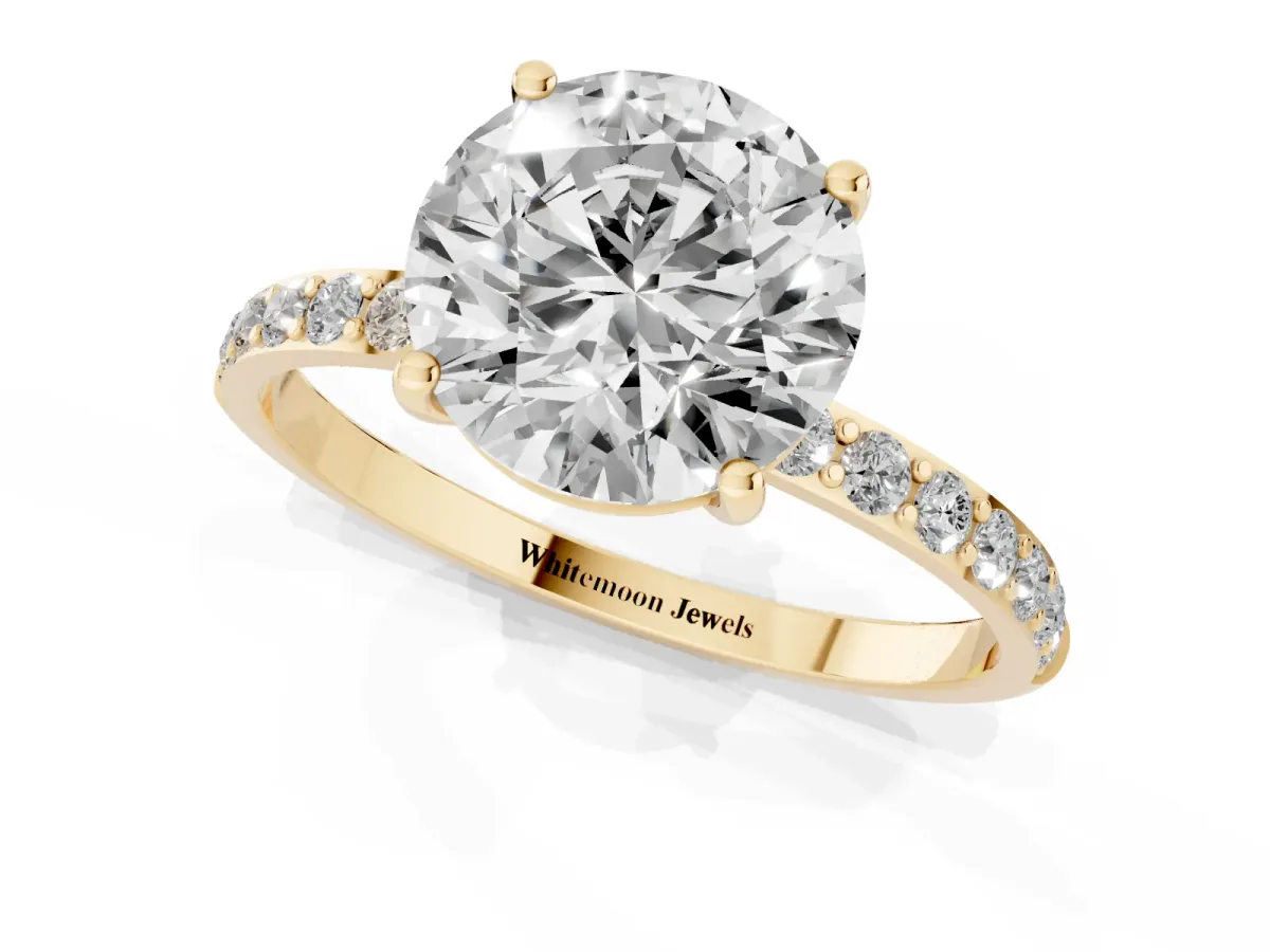 Round Cut Diamond Solitaire Ring with Round Pavé Shoulders and Prong Setting Yellow gold