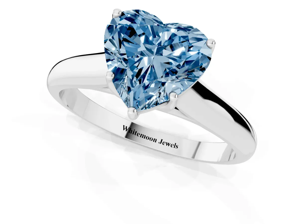 Fancy Blue Heart Cut Cut Diamond Solitaire Engagement Ring with Tapered Plain Band and Four-Prong Setting Platinum