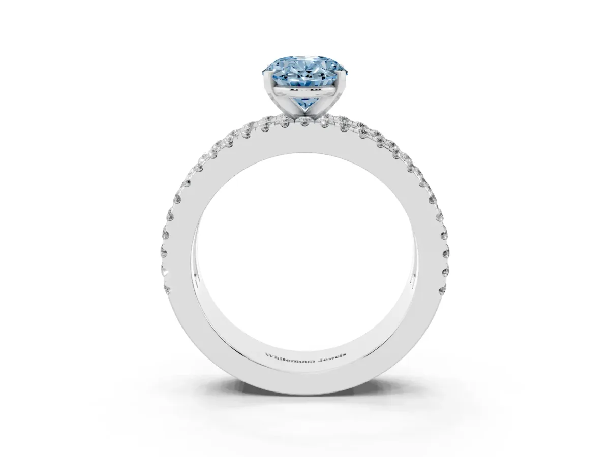 Fancy Blue Oval Cut Diamond Solitaire Ring with Pavé and Channel Set Band Silver