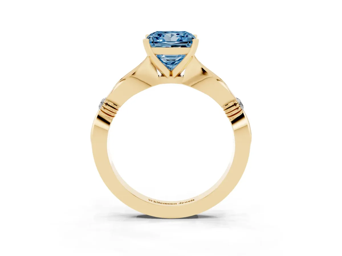 Fancy Blue Princess Cut Solitaire Diamond Twisted Band with Four-Prong Setting Yellow gold