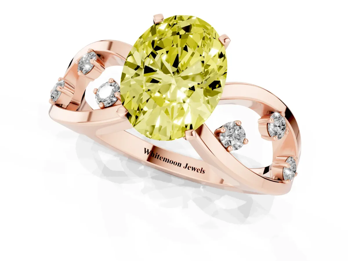 Fancy Yellow Oval Cut Cut Solitaire Diamond with Side Stones on Criss-Cross Band and Four-Prong Setting Rose gold