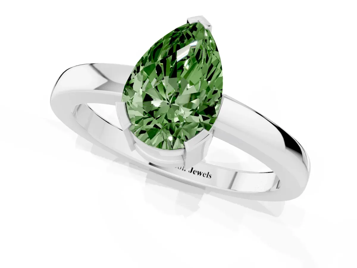 Fancy Green Pear Cut Cut Solitaire Ring with Four-Prong Setting and Classic Band Silver