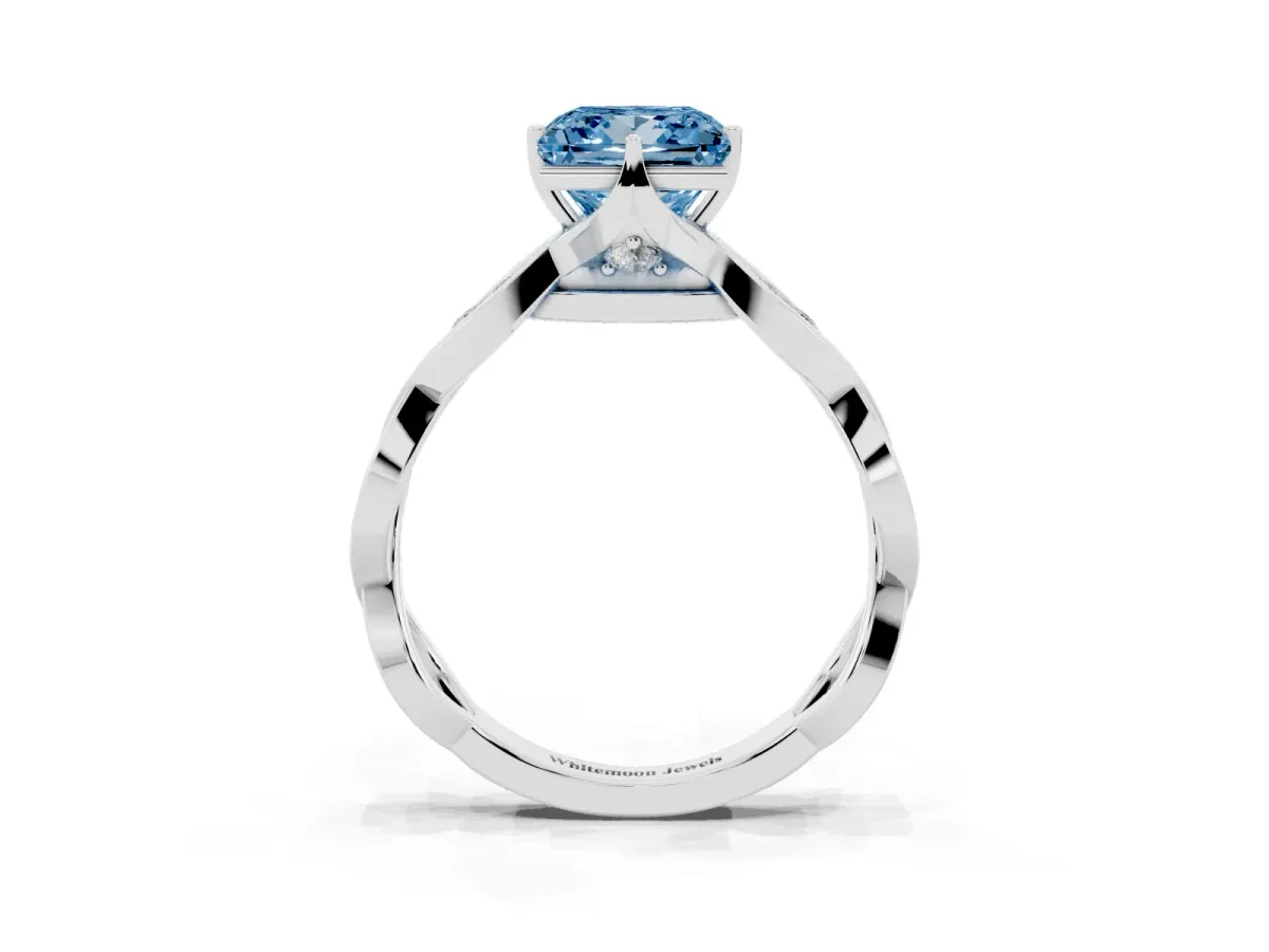 Fancy Blue Princess Cut Solitaire Twist Band with Leaf Prong Setting Silver