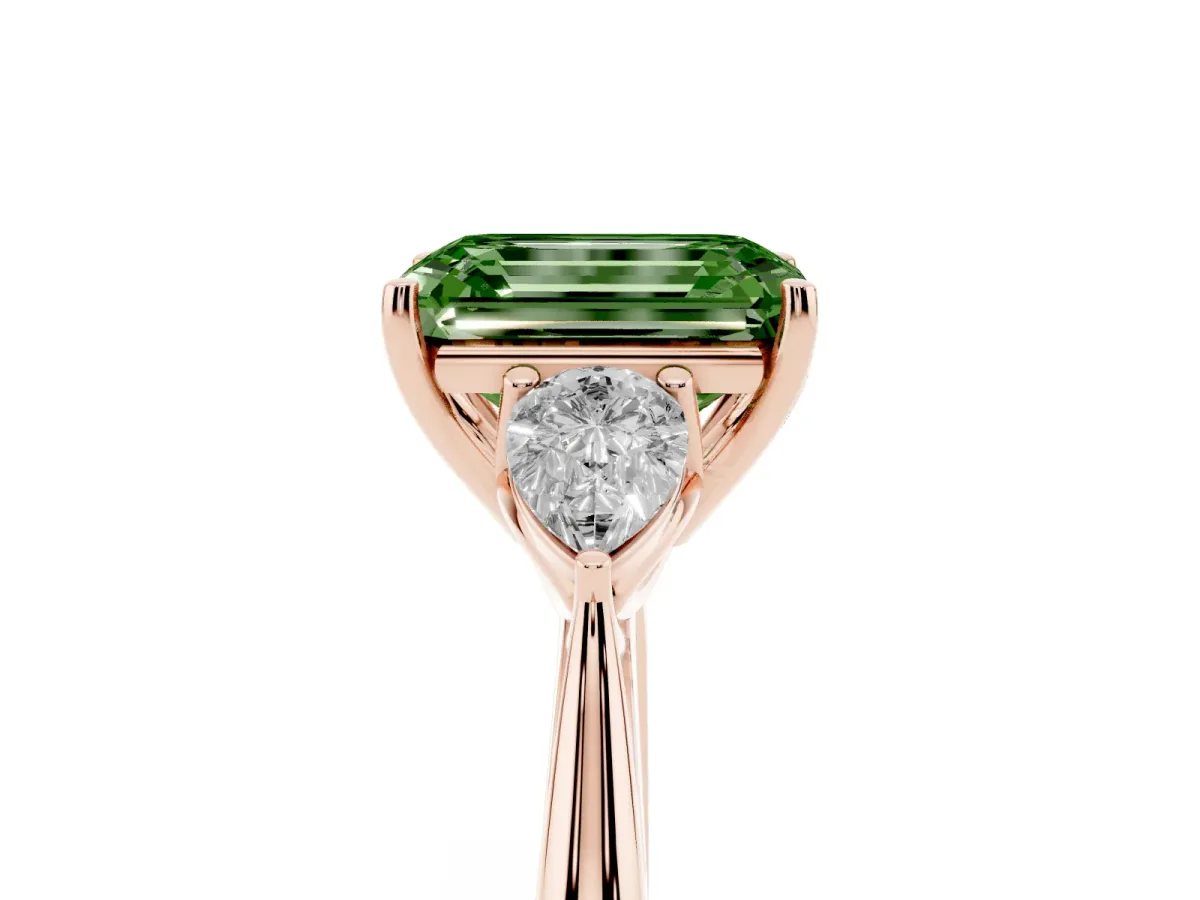 Fancy Green Three-Stone Emerald Cut Diamond Ring with Pear Side Stones in Four-Prong Setting Rose gold