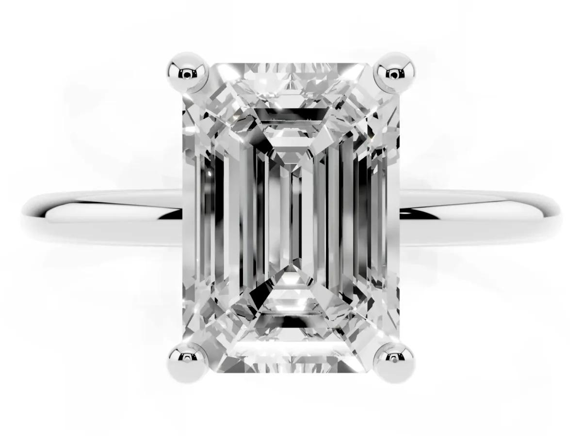 Emerald Cut Solitaire Diamond Ring with 4-Prong Setting on a Classic Band Silver