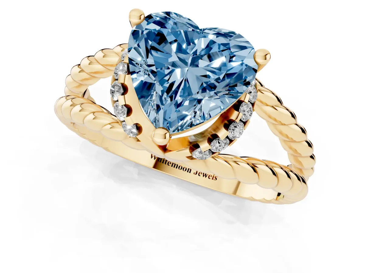 Fancy Blue Heart Cut Halo Twisted Band Four-Prong Ring Yellow gold