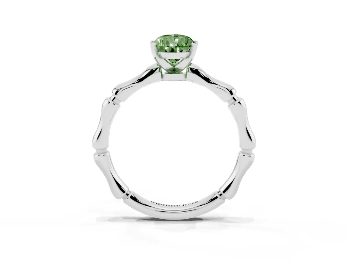 Fancy Green Pear Cut Solitaire Diamond Ring with Bamboo Band and Four-Prong Setting Silver