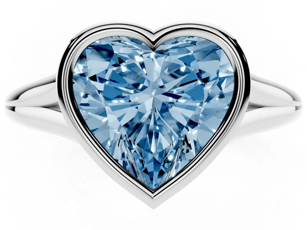 Fancy Blue Bezel Set Heart Cut Cut Solitaire Ring with Tapered Band White gold