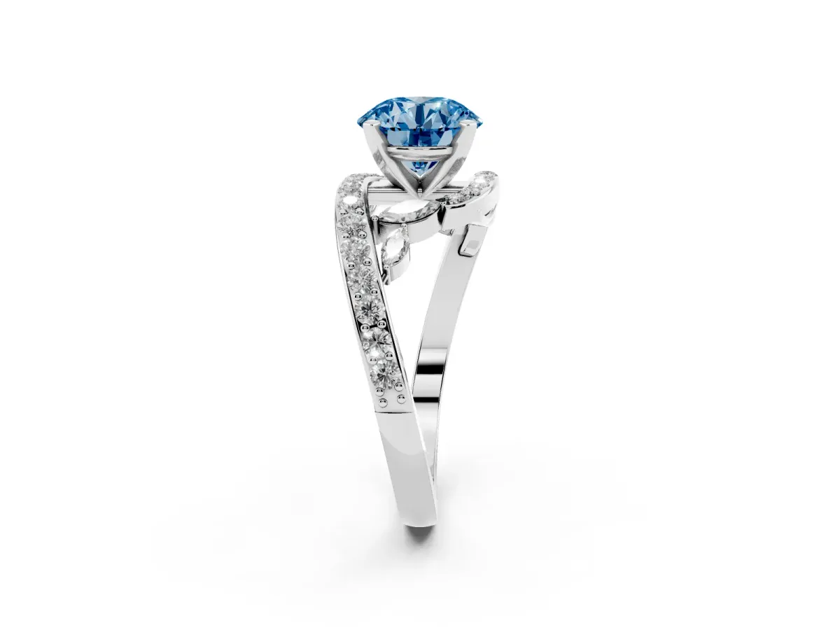 Fancy Blue Round Cut Solitaire with Pavé Twist Band and Four-Prong Setting Silver