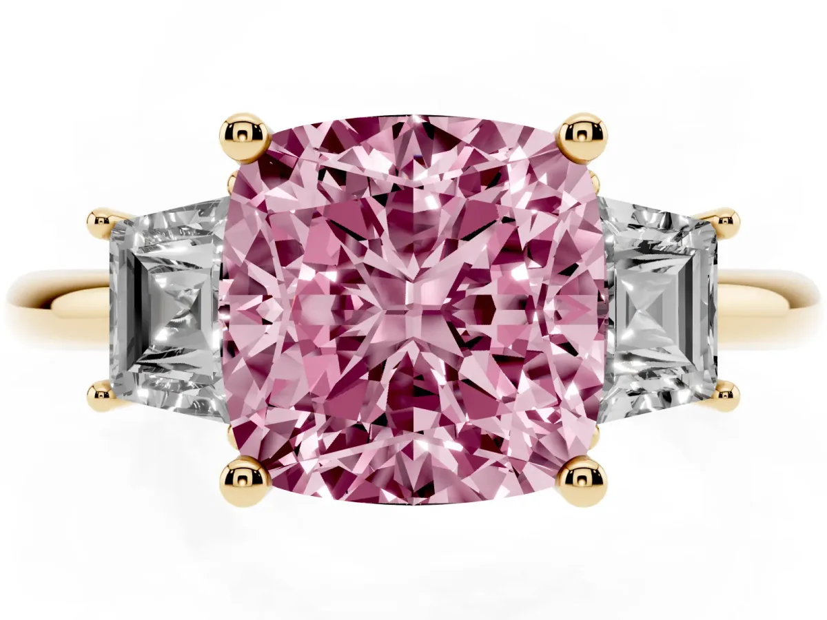 Fancy Pink Cushion Cut Diamond Three-Stone Ring with Trapezoid Side Stones and Prong Setting Yellow gold