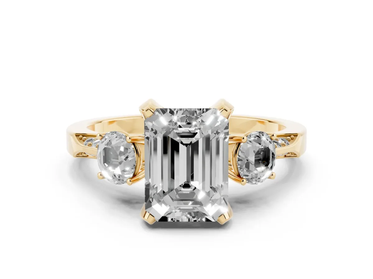 Fancy Blue Emerald Cut Brilliant Three-Stone Diamond Ring with Pavé Band and Four-Prong Setting Yellow gold