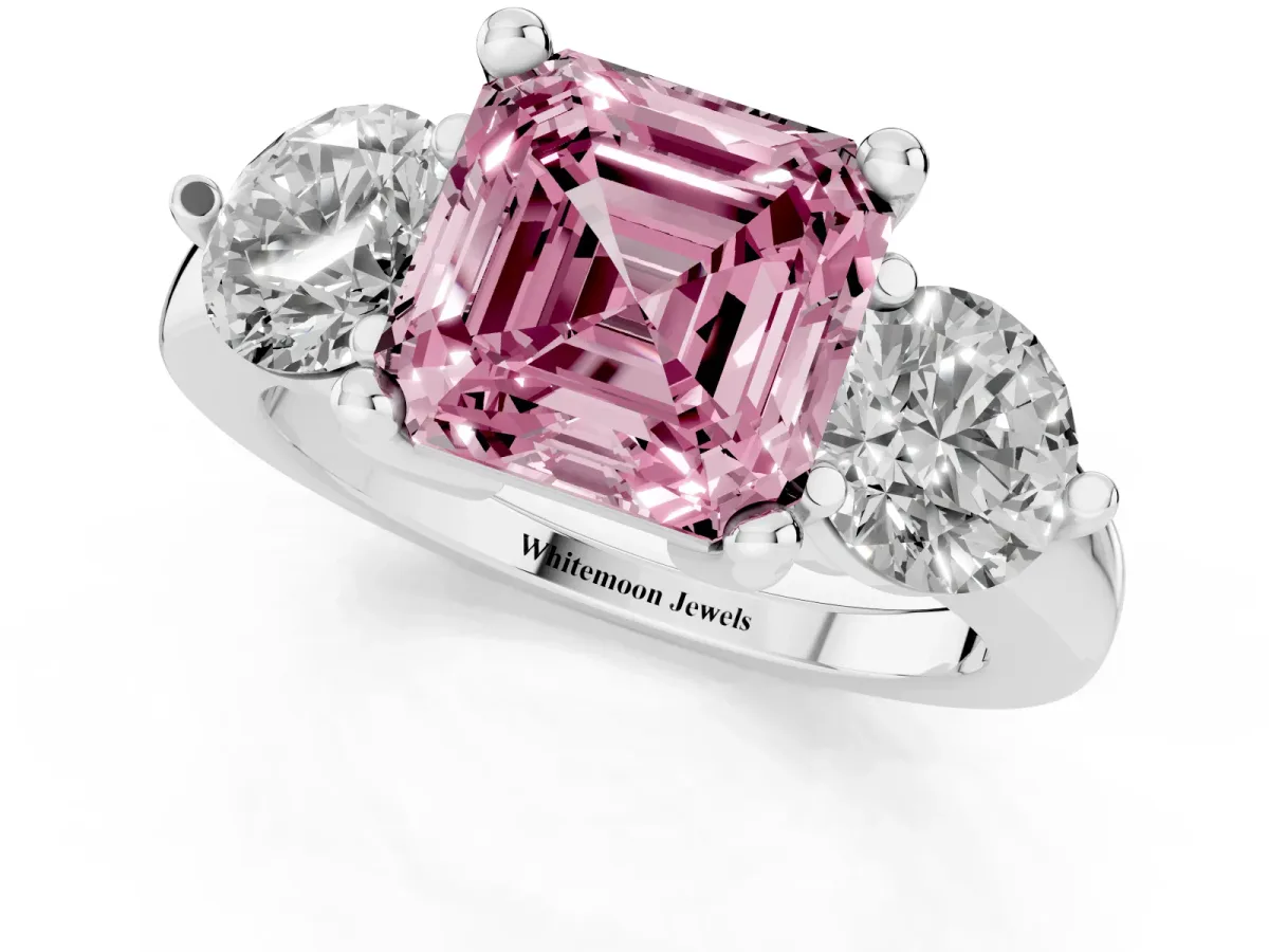 Fancy Pink Three-Stone Asscher Cut Brilliant Cut Solitaire Ring with Prong Setting on a Classic Band Platinum