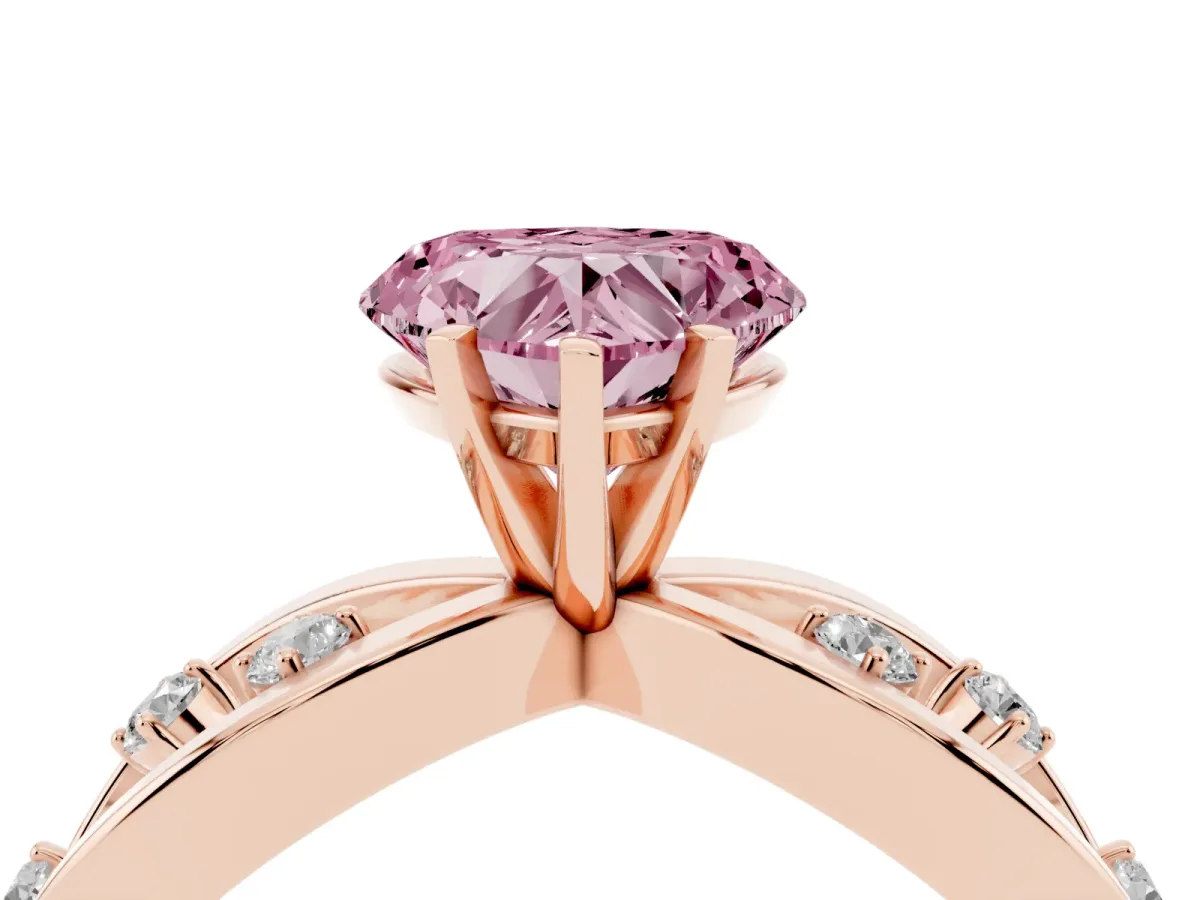 Fancy Pink Heart Cut Cut Solitaire Diamond with Side Stones on Criss-Cross Band and Four-Prong Setting Rose gold