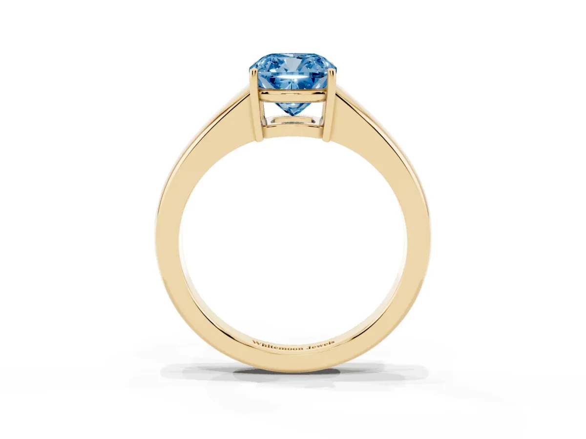 Fancy Blue Cushion Cut Solitaire Diamond Ring with Tapered Band and Four-Prong Setting Yellow gold