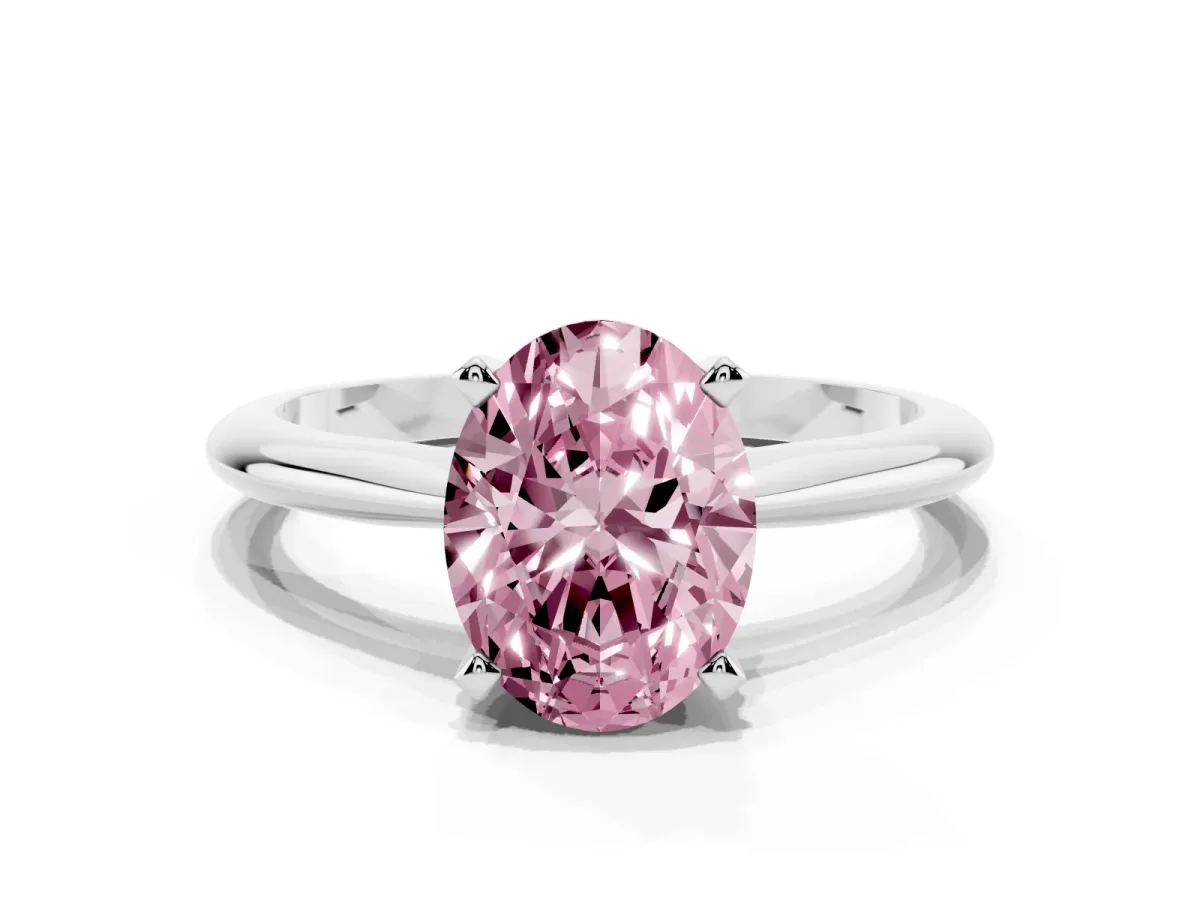 Fancy Pink Oval Cut Cut Solitaire Ring with Four-Prong Setting on a Classic Band Silver