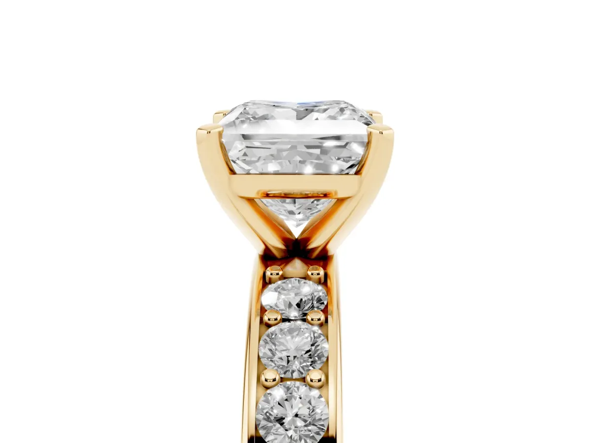 Princess Cut Diamond Engagement Ring with Channel Set Round Band and Prong Setting Yellow gold