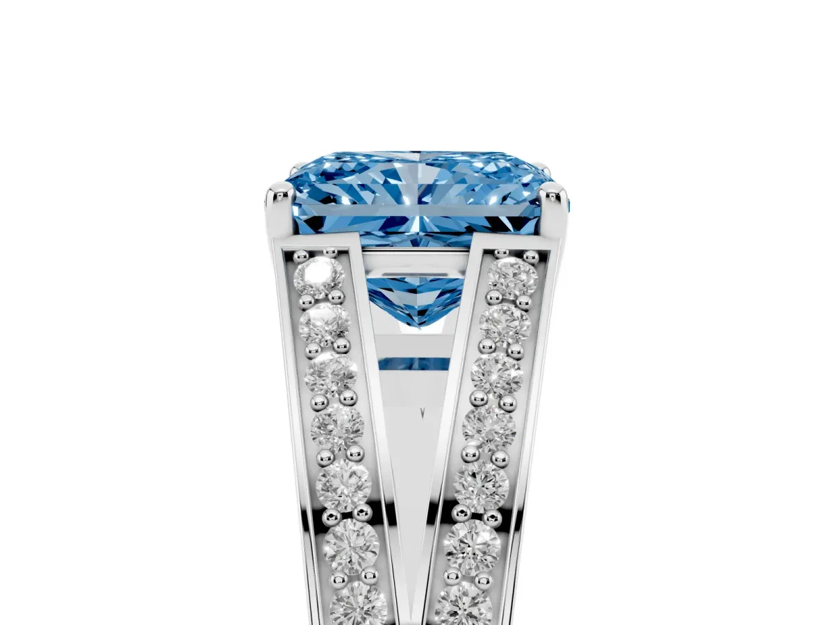 Fancy Blue Radiant Cut Diamond Split Shank Ring with Pavé Band and Four-Prong Setting White gold