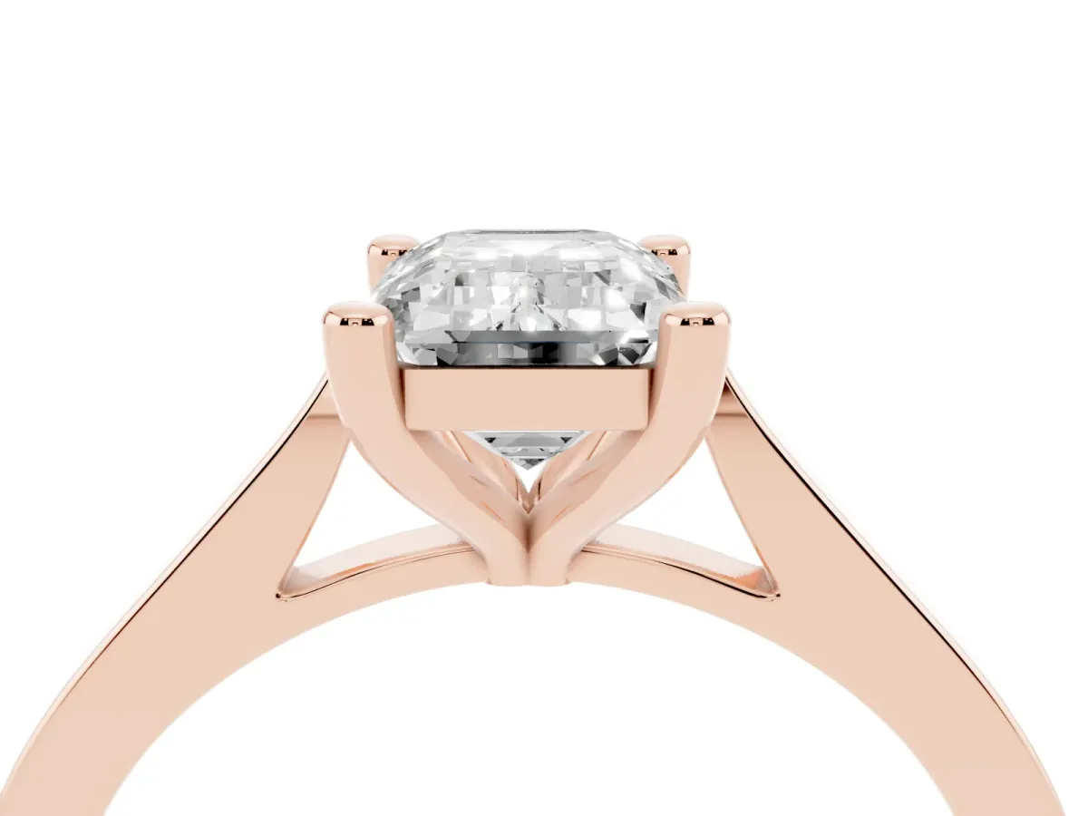 Emerald Cut Solitaire Diamond Ring with Four-Prong Setting and Tapered Band Rose gold
