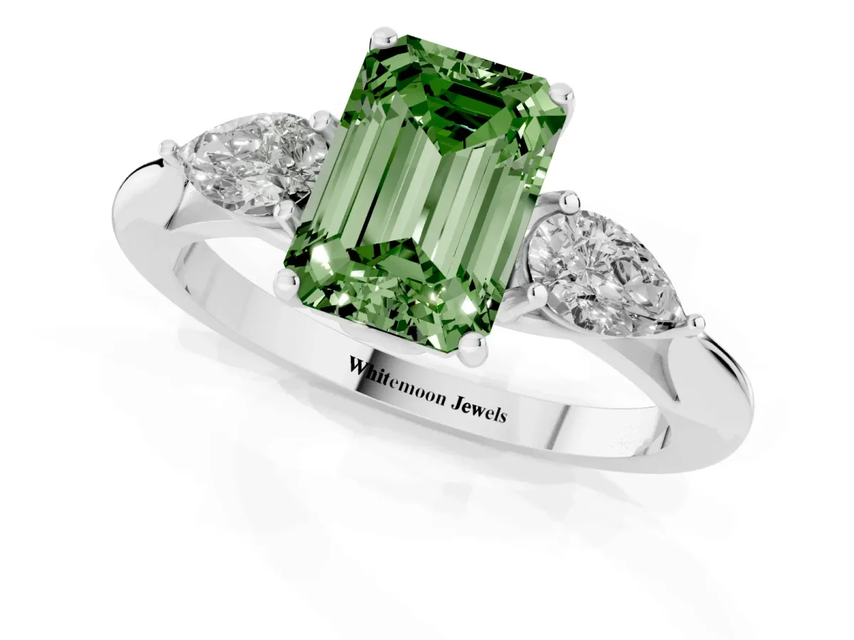 Fancy Green Emerald Cut Diamond Three-Stone Ring with Pear Side Stones and Prong Setting Silver