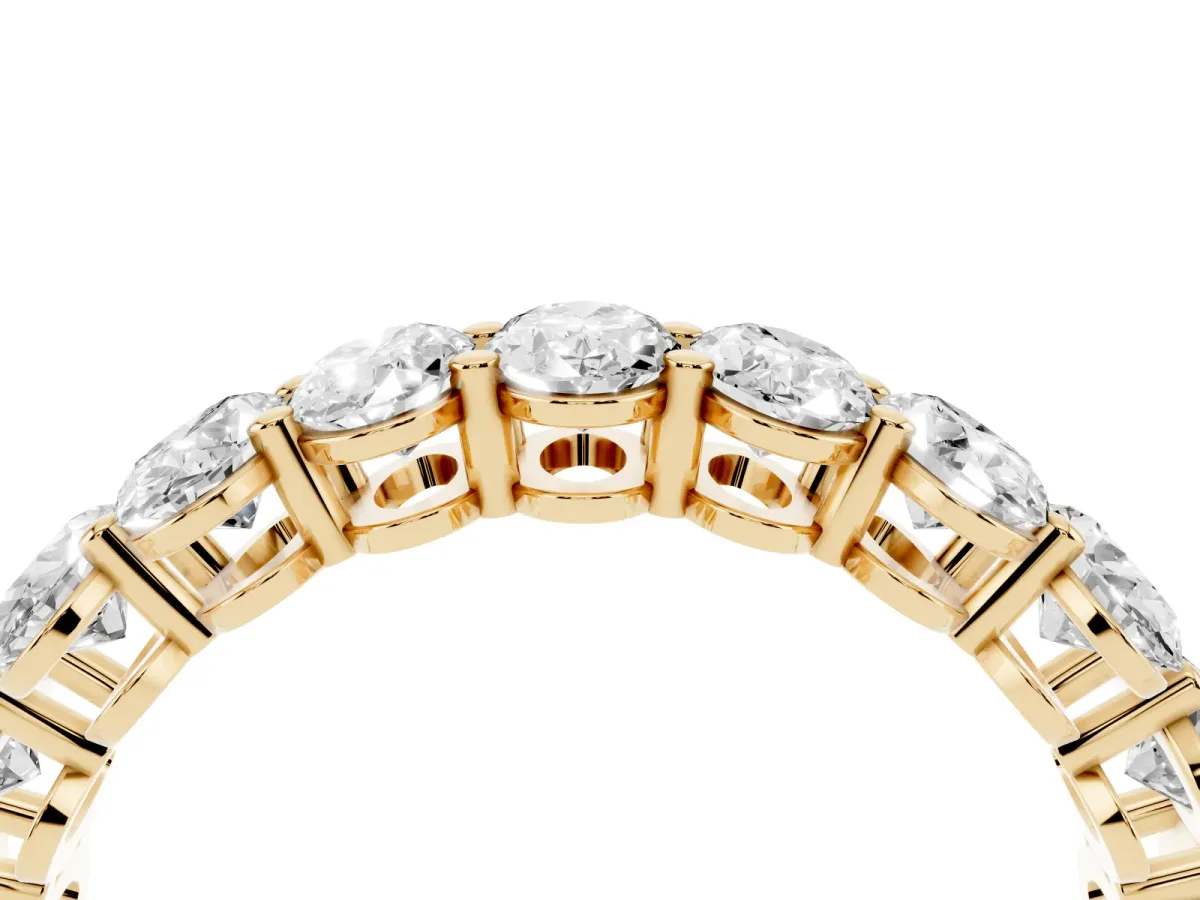 Oval Cut Diamond Eternity Band with Shared Prong Setting Yellow gold