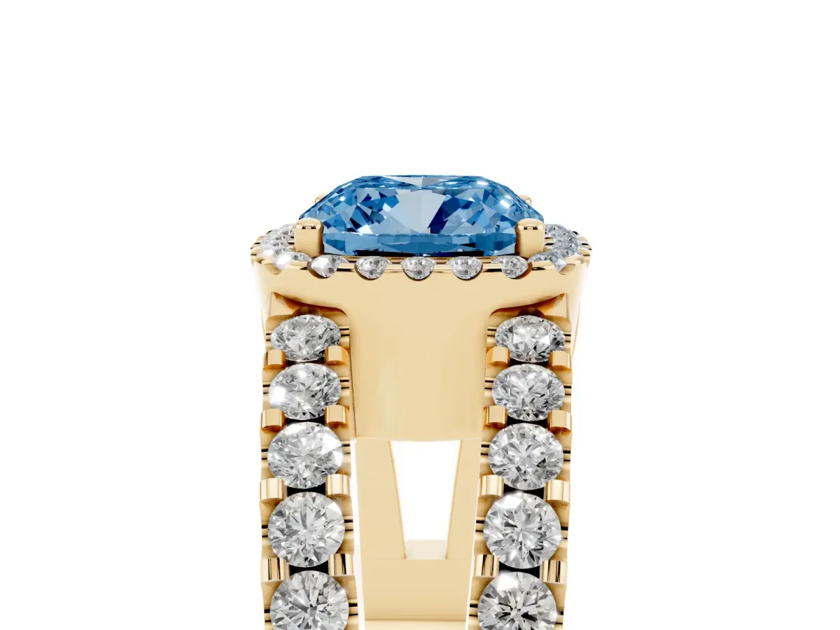 Fancy Blue Cushion Cut Cut Halo Split Shank Diamond Ring with Four-Prong Setting Yellow gold