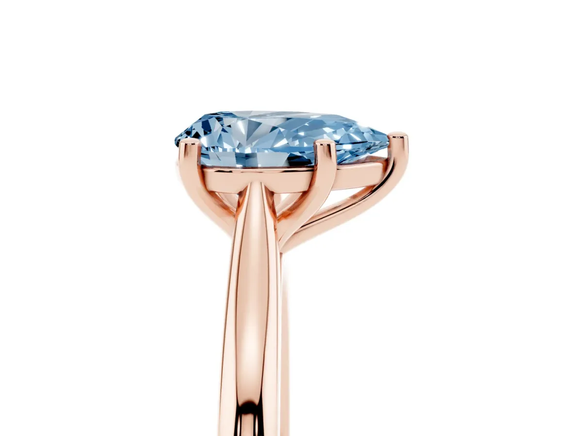 Fancy Blue Pear Cut Cut Solitaire Ring with Cathedral Band and Four-Prong Setting Rose gold