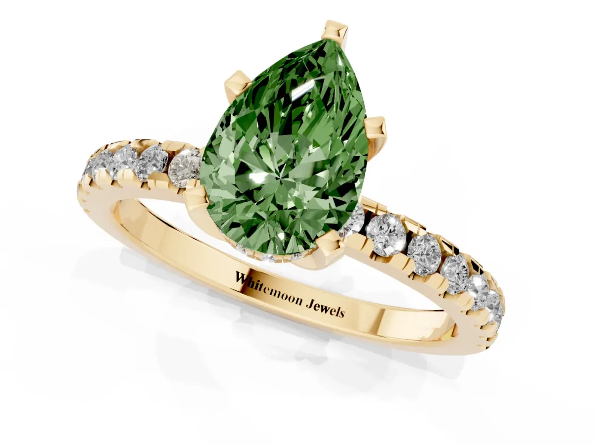 Fancy Green Pear Cut Diamond Solitaire Ring with Round Pavé Band and Four-Prong Setting Yellow gold