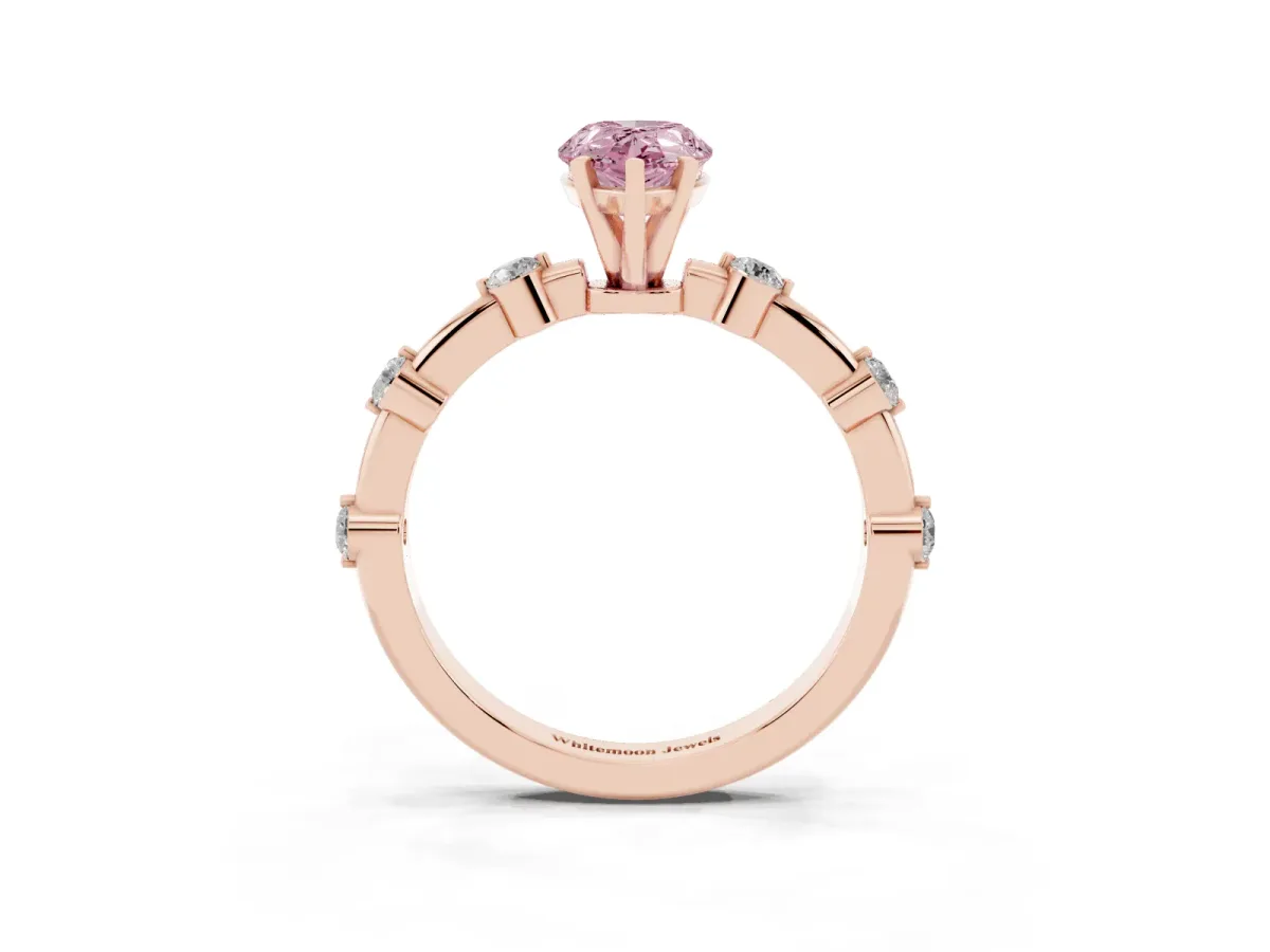 Fancy Pink Pear Cut Solitaire Diamond Ring with Bezel Set Side Stones and Prong Setting Rose gold