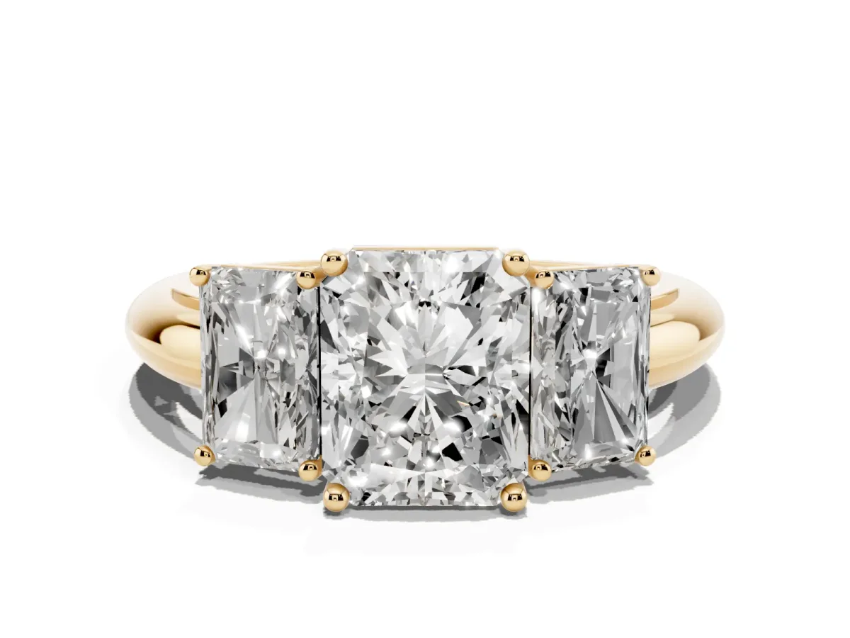 Three-Stone Radiant Cut Cut Diamond Engagement Ring with Prong Setting on a White Gold Band Yellow gold