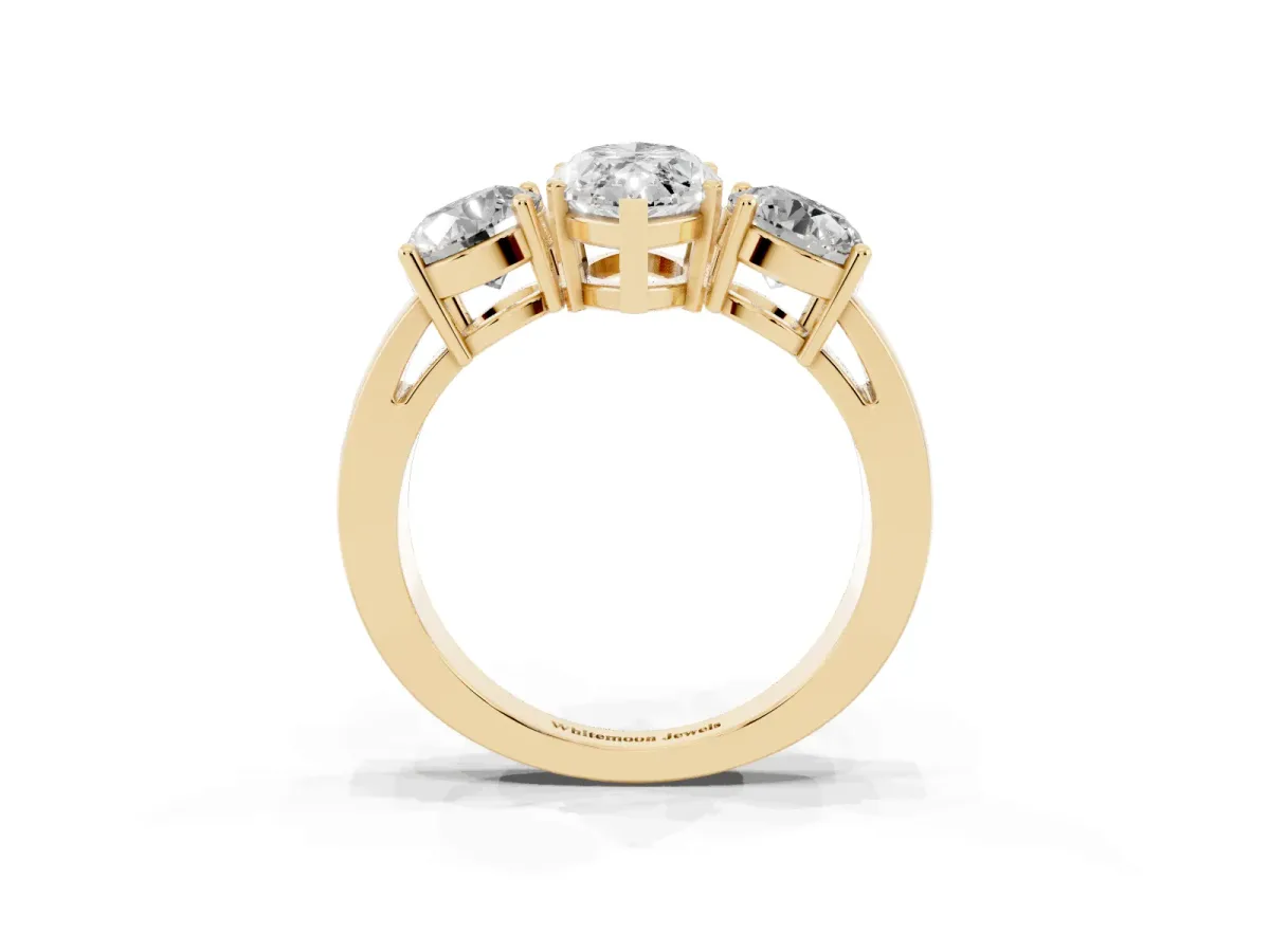 Three-Stone Marquise Cut Diamond Ring with Round Side Stones, Classic Band, and Four-Prong Setting Yellow gold