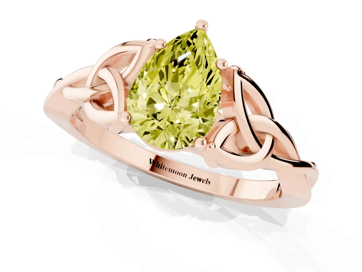 Fancy Yellow Pear Cut Diamond Solitaire Engagement Ring with Celtic Knot Band and Four-Prong Setting Rose gold