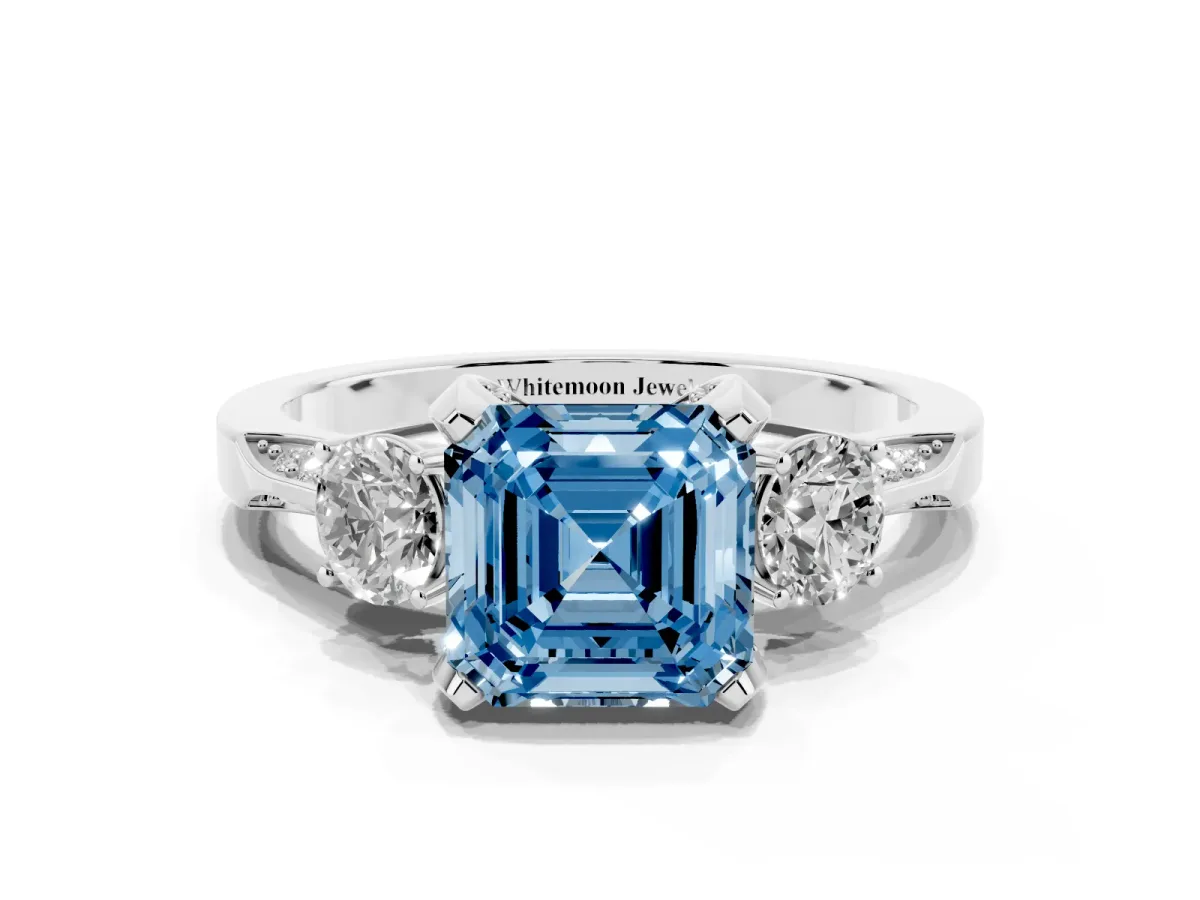 Fancy Blue Asscher Cut Brilliant Three-Stone Diamond Ring with Pavé Band and Four-Prong Setting White gold