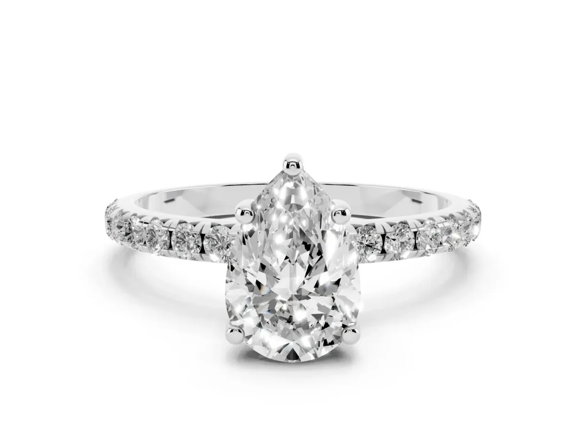 Pear Cut Cut Diamond Solitaire Ring with Micro Pave Band and Four Prong Setting Silver