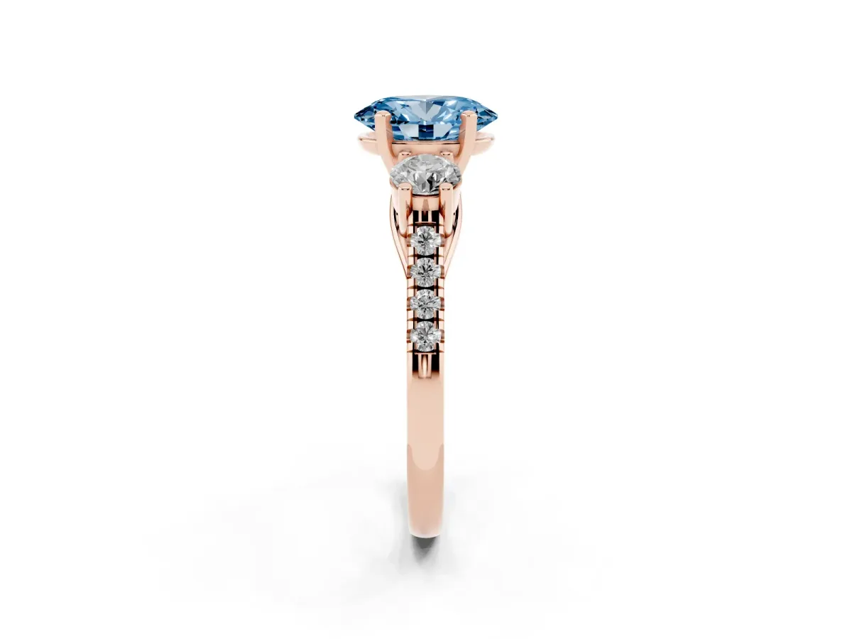 Fancy Blue Three-Stone Oval Cut Diamond Pavé Band with Four-Prong Setting Rose gold