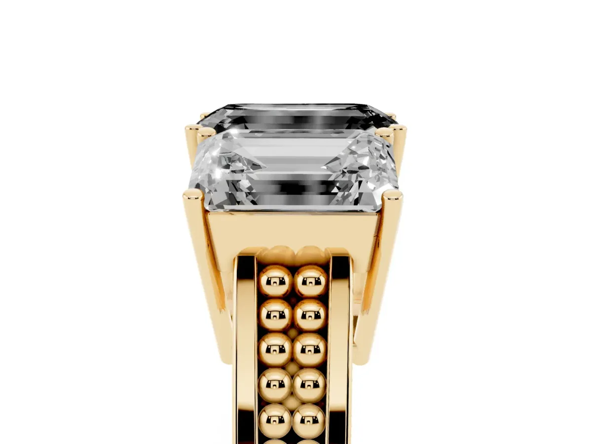 Fancy Black Emerald Cut Diamond Three-Stone Ring with Prong Setting and Textured Band Yellow gold