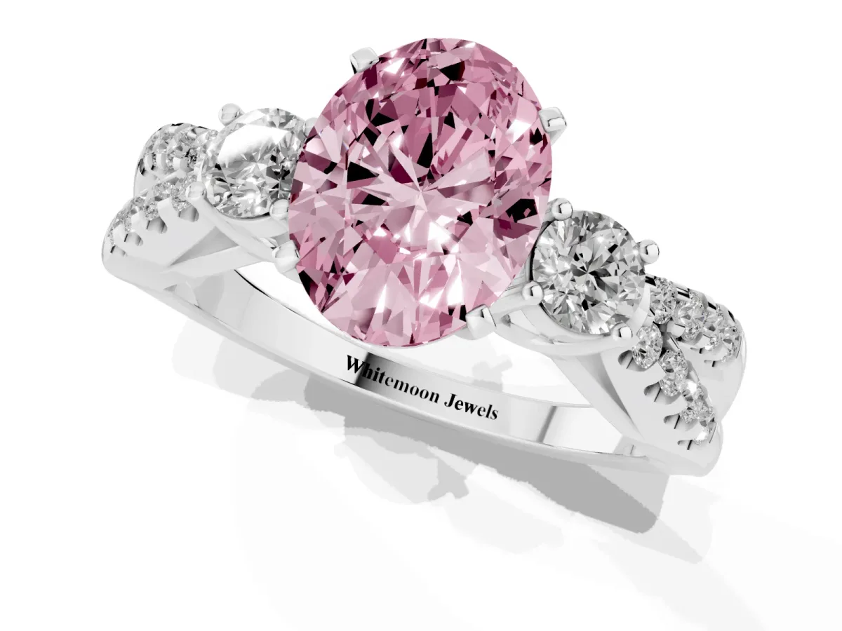 Fancy Pink Oval Cut Diamond Three-Stone Ring with Pavé Split Shank and Four-Prong Setting Silver