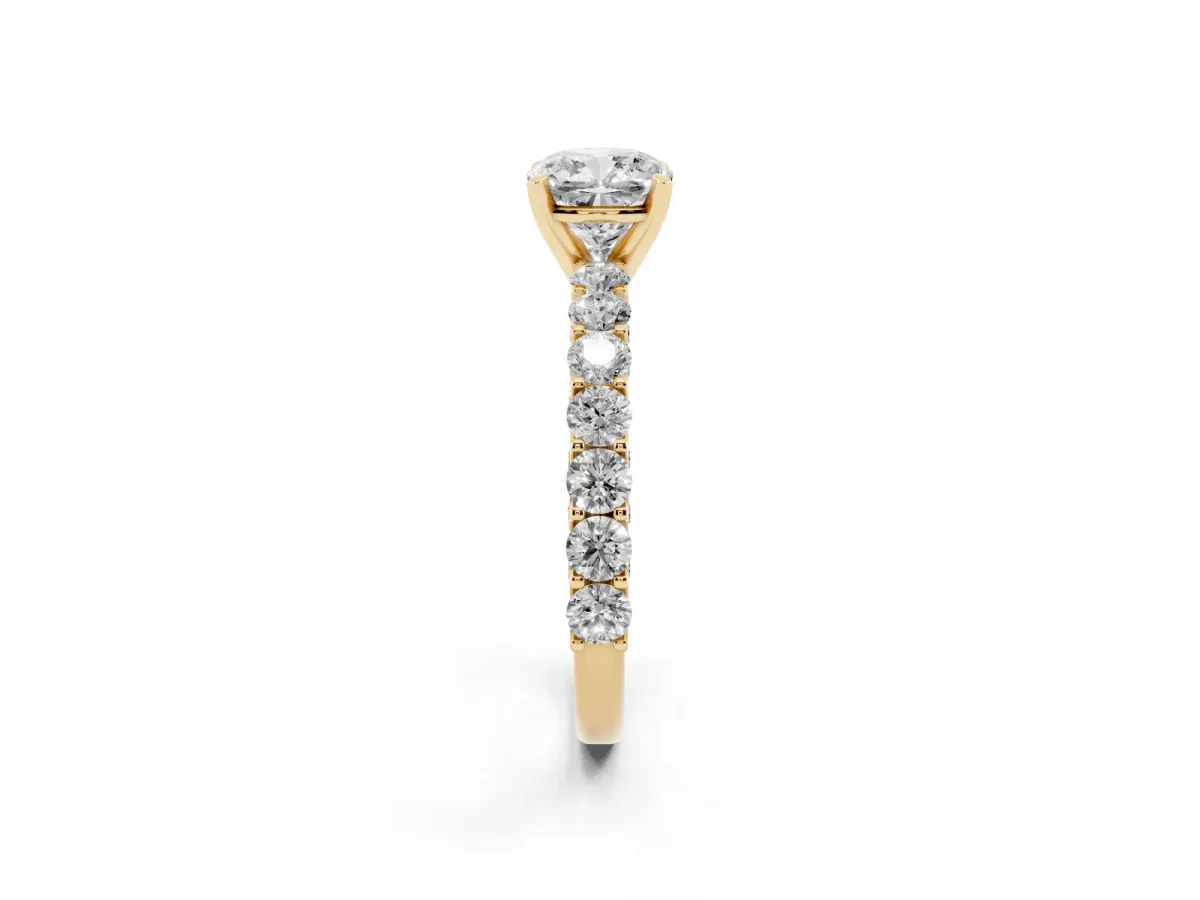 Cushion Cut Diamond Solitaire Ring with Shared Prong Pavé Band and Four-Prong Setting Yellow gold