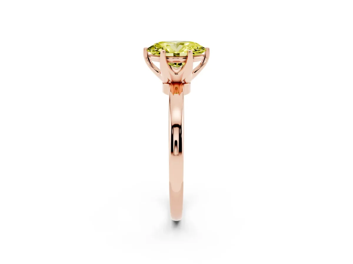 Fancy Yellow Oval Cut Solitaire Diamond Ring with Six-Prong Setting on a Classic Band Rose gold