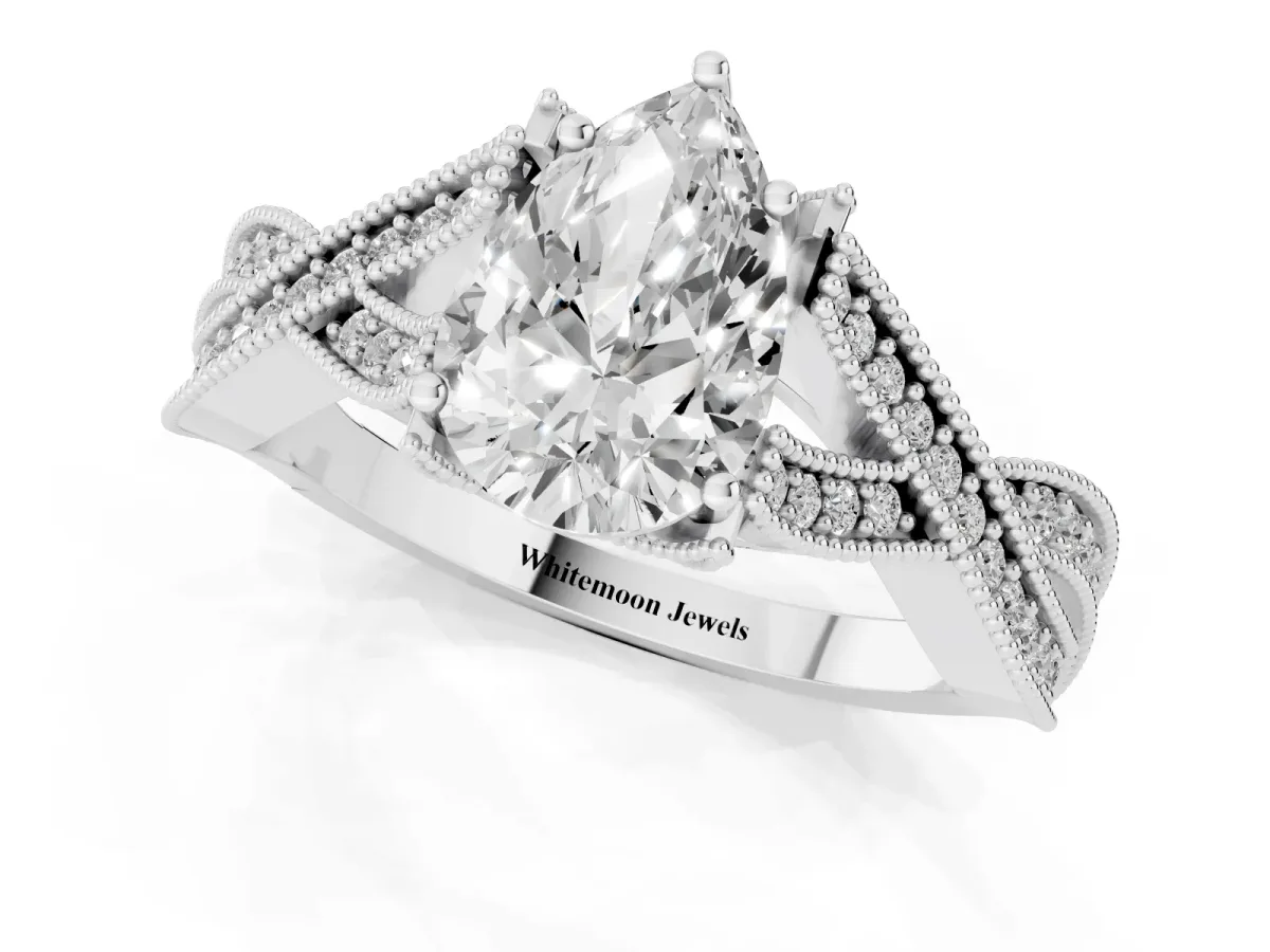 Pear Cut Cut Diamond Twisted Band with Milgrain Pave Setting and Four-Prong Setting Platinum